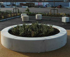 Roosevelt - round precast concrete outdoor planter for public spaces