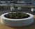 Roosevelt - round precast concrete outdoor planter for public spaces 0