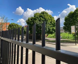 Vertical bar railings and sliding gate secure luxury care home