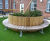 Swithland circular planter with integral bench 0