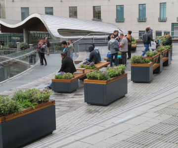 Integrated seating & planters enhance shopping centre