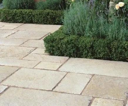 Honey Cathedral hand-cut limestone paving and setts