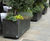 Bespoke movable bronze barrier planters for restaurant 1