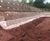 Earth anchors stabilise 6m-high, 137m-long slope at business park 10