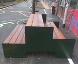 Bespoke iroko and steel tiered seating for leisure centre - London - on this page