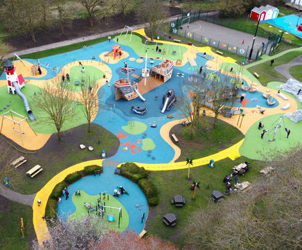 Wet pour impact-absorbing rubber crumb safety surfacing for playgrounds