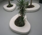 Amop Cell Forms concrete and steel planters - on this page