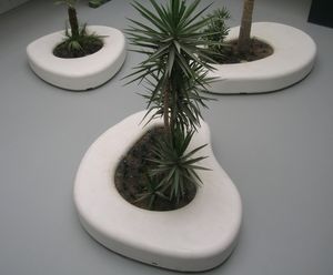 Amop Cell Forms concrete and steel planters