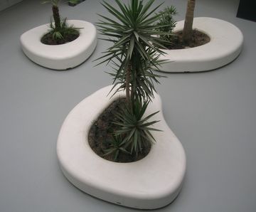 Amop Cell Forms concrete and steel planters