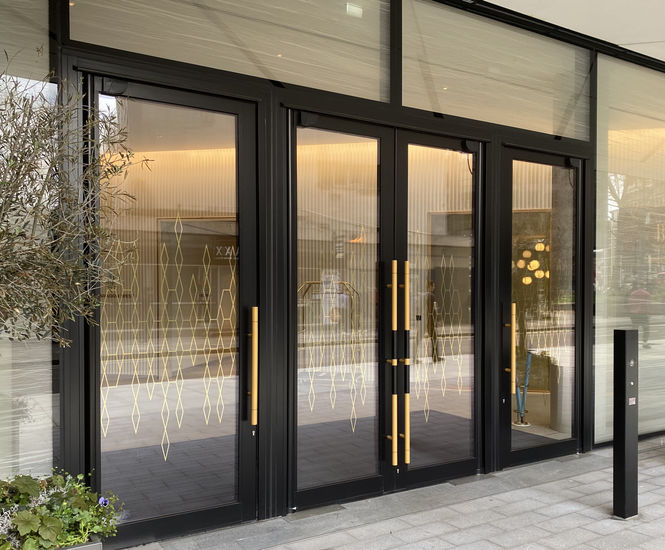 Invisible swing door automation - The Broadway