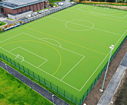 Artificial grass sports surfacing
