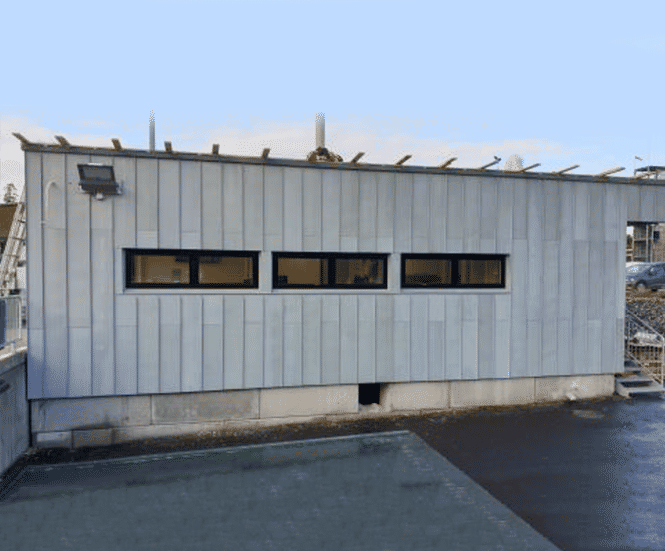 RHEINZINK cladding from museum repurposed for 3 new buildings | RHEINZINK