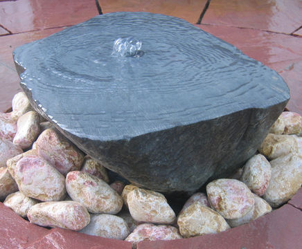 Sawn boulder bubbling water feature