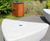 Outdoor seating and bins for new housing estate's community space 9