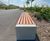 Outdoor seating and bins for new housing estate's community space 6
