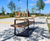 Rustic timber seating and picnic sets for new community 0