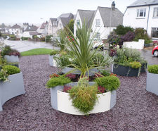 Black and white planters brighten central community area