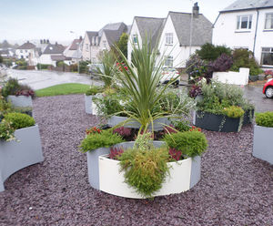 Black and white planters brighten central community area
