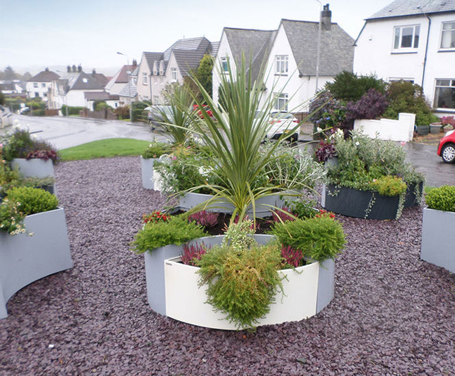 Black and white planters brighten central community area