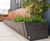 Bespoke stainless steel planters and benching for Berkeley Square 2
