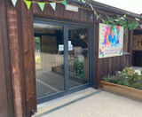Bi-parting sliding doors provide welcoming access at Hobbledown - on this page