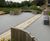 Porous resin bound surfacing for luxury apartment complex 0