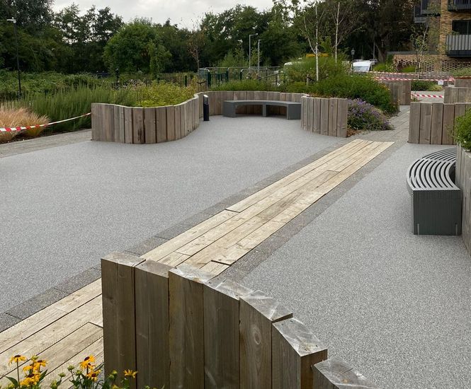 Porous resin bound surfacing for luxury apartment complex