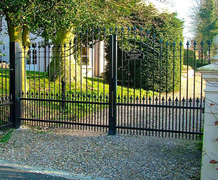 Ornamental arched-top steel gates