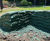 Topsoil-filled bagwork used to created retaining wall in garden 4