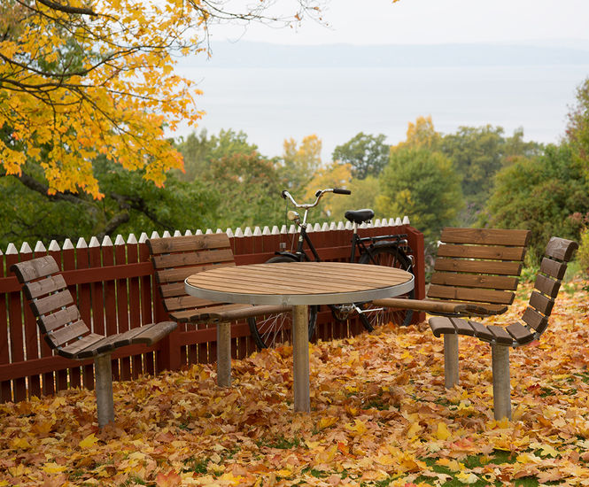 Sofiero Round Table - outdoor wood and metal table for public spaces