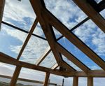 Rafterline patent glazing system for timber-framed roofs