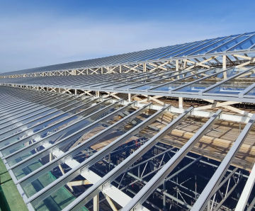 Skyline patent glazing system