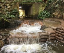 Concrete filled bagwork for erosion control and scour protection
