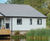 Weatherboard cladding and Edgemere roofing for charity building 3