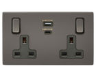 Discreet USB charging with double-switched sockets
