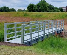 9m-long all-steel vandal- and arson-resistant beam footbridge