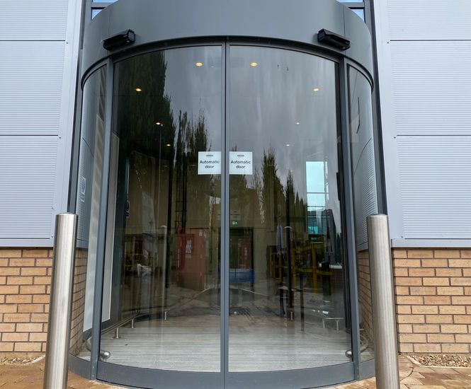 Automatic sliding doors for prestigious commercial facility