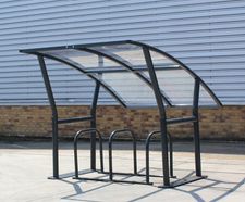 Portland -  asymmetric cycle shelter with angled polycarbonate roof