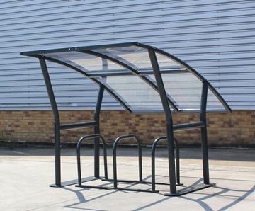 Portland -  asymmetric cycle shelter with angled polycarbonate roof
