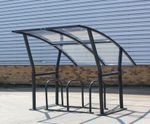 Portland - asymmetric cycle shelter with angled polycarbonate roof