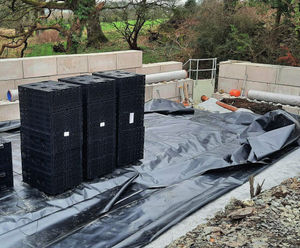 Attenuation tank installation for housing development