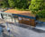 Secure sheltered cycle parking and repair station for university 0