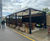 Canopies protect customers at hospital's outdoor charity cafe 1