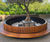 Bespoke planter seat encloses and supports sculpture - Wimbledon 1