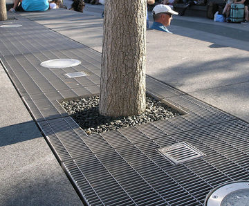 Pressure-locked stainless steel floor gratings
