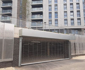 Electrically-operated stainless steel security rolling grilles