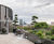 Planters, seating and floor tiles for fire-rated roof terrace 1