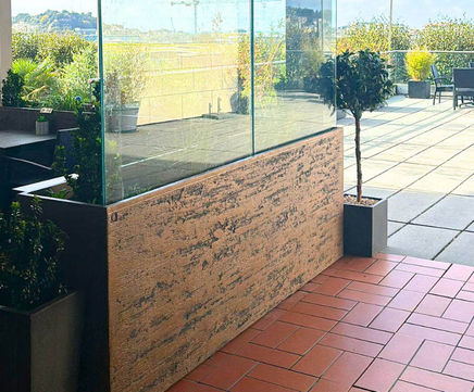 Bespoke UHPC trough planters with integrated glass balustrades
