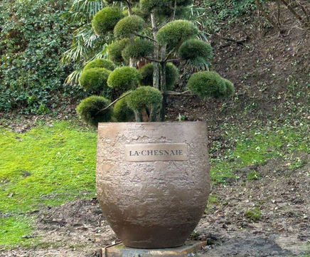 Bespoke hand-crafted UHPC plant pot with personalised branding