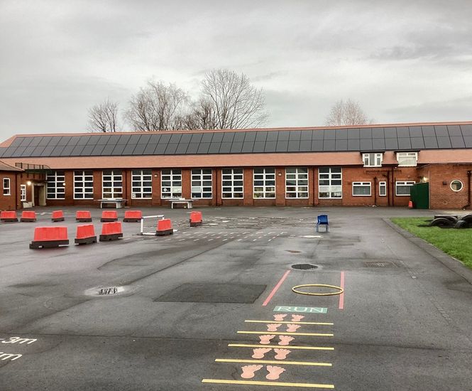 Clay and solar PV tiles for sustainable roof renovation at school